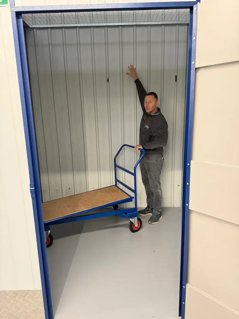 50 sq ft premium indoor self storage unit in Hull showing furniture, boxes and stacked storage space