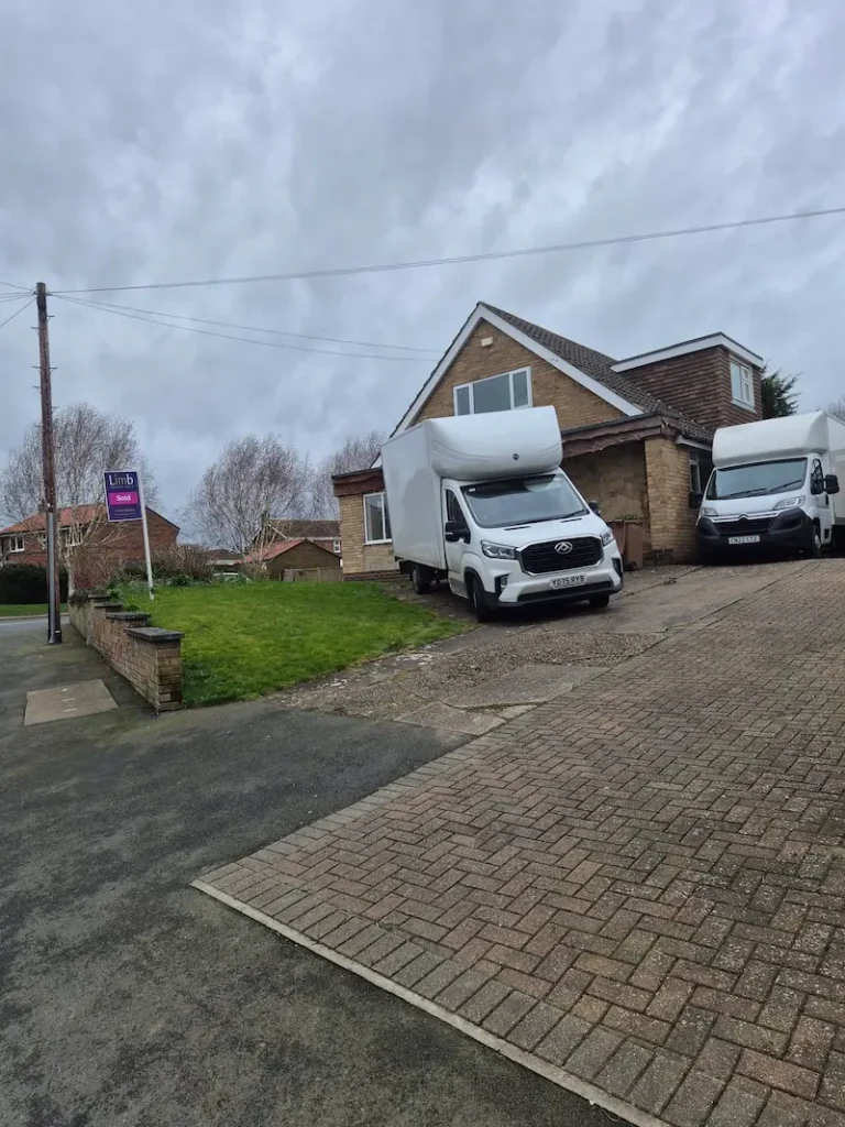 Two Luton removal vans unloading a large house move at Lockd Future Self Storage in Hull